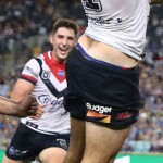 SYDNEY, AUSTRALIA - MARCH 29: James Tedesco of the Roosters celebrates scoring a try with team mate Joseph Manu of the Roosters during the round three NRL match between the Parramatta Eels and the Sydney Roosters at ANZ Stadium on March 29, 2019 in Sydney, Australia. (Photo by Mark Metcalfe/Getty Images)
