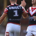 SYDNEY, AUSTRALIA - MARCH 13: Nat Butcher of the Roosters celebrates with James Tedesco of the Roosters after scoring a try during the round one NRL match between the Sydney Roosters and the Manly Sea Eagles at the Sydney Cricket Ground, on March 13, 2021, in Sydney, Australia. (Photo by Cameron Spencer/Getty Images)